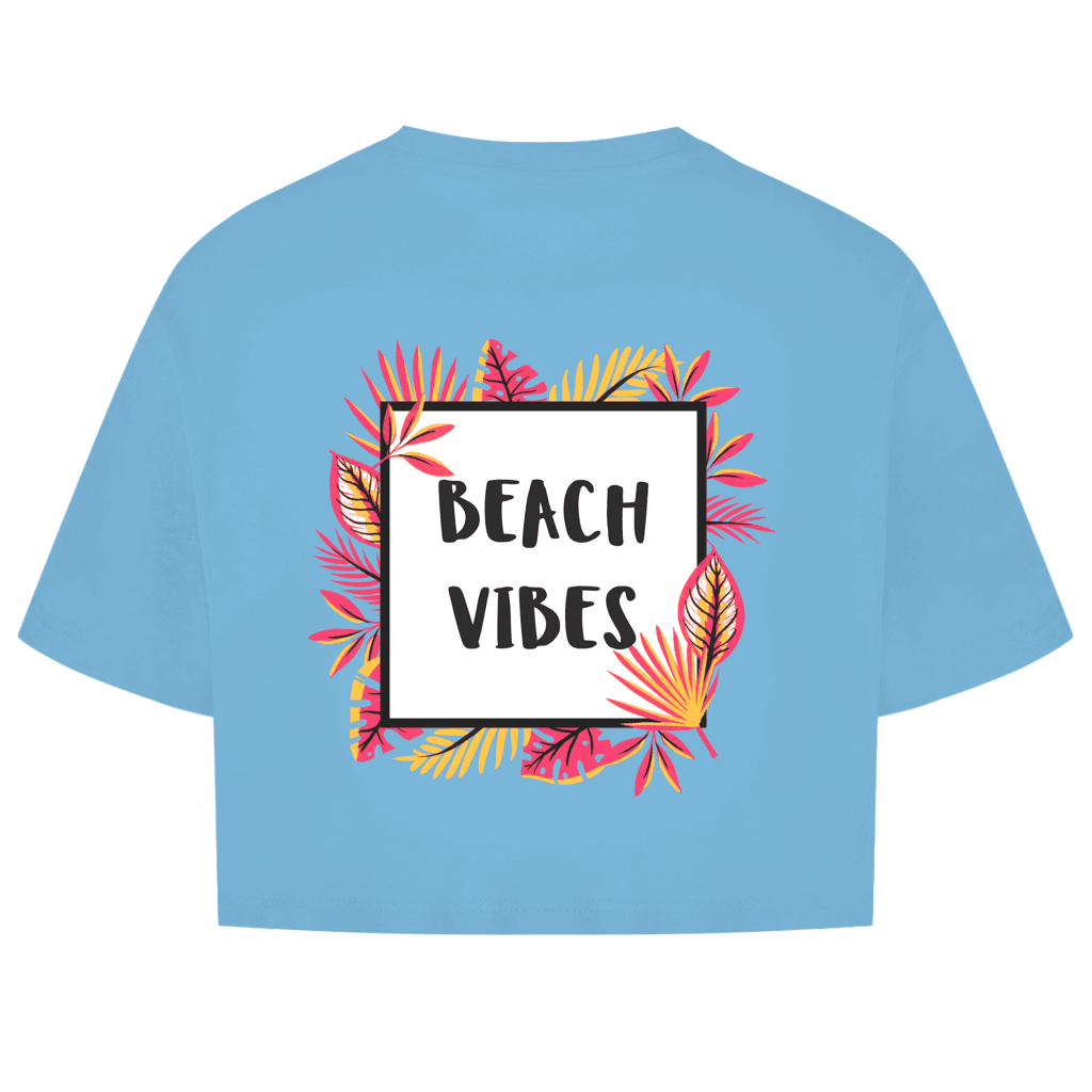 Outlindes Quadrat mit schwarzem Rahmen. Blumenranken in pink und gelb herum. Mittig der Designname in zwei Zeilen.