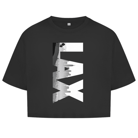 Schwarzes Oberteil mit dem Airport Code, vertikaler Druck. Über den 3 Buchstaben liegt als Bild die Skyline der Stadt.