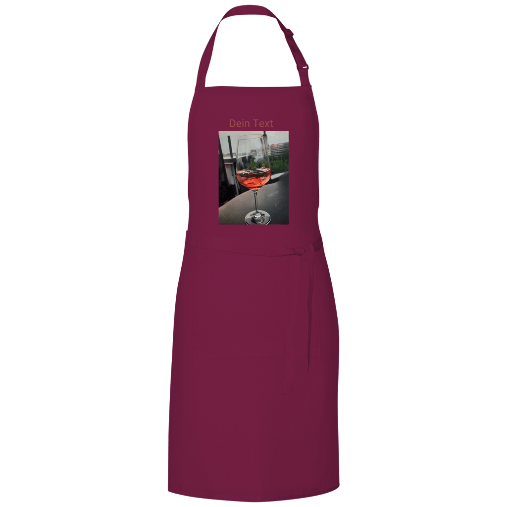 Dunkelrote Kochschürze mit indiv. Foto. Hier: Glas Aperol mit Eiswürfel. Fernweh zum Anziehen? travelPrint4U.de