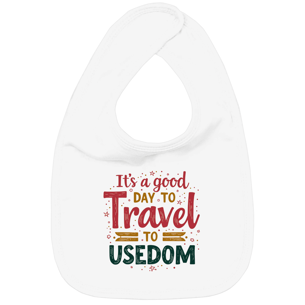 Weisses Lätzchen mit verspieltem rot, gelb und grünem Schriftzug. Ab an die Ostsee? Los geht’s für kleine Abenteurer!