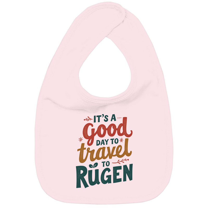 Lätzchen mit A GOOD DAY TO TRAVEL TO RÜGEN Print. Stoff-Farbe: Powder Pink. Fernweh zum Anfassen? travelPrint4U.de